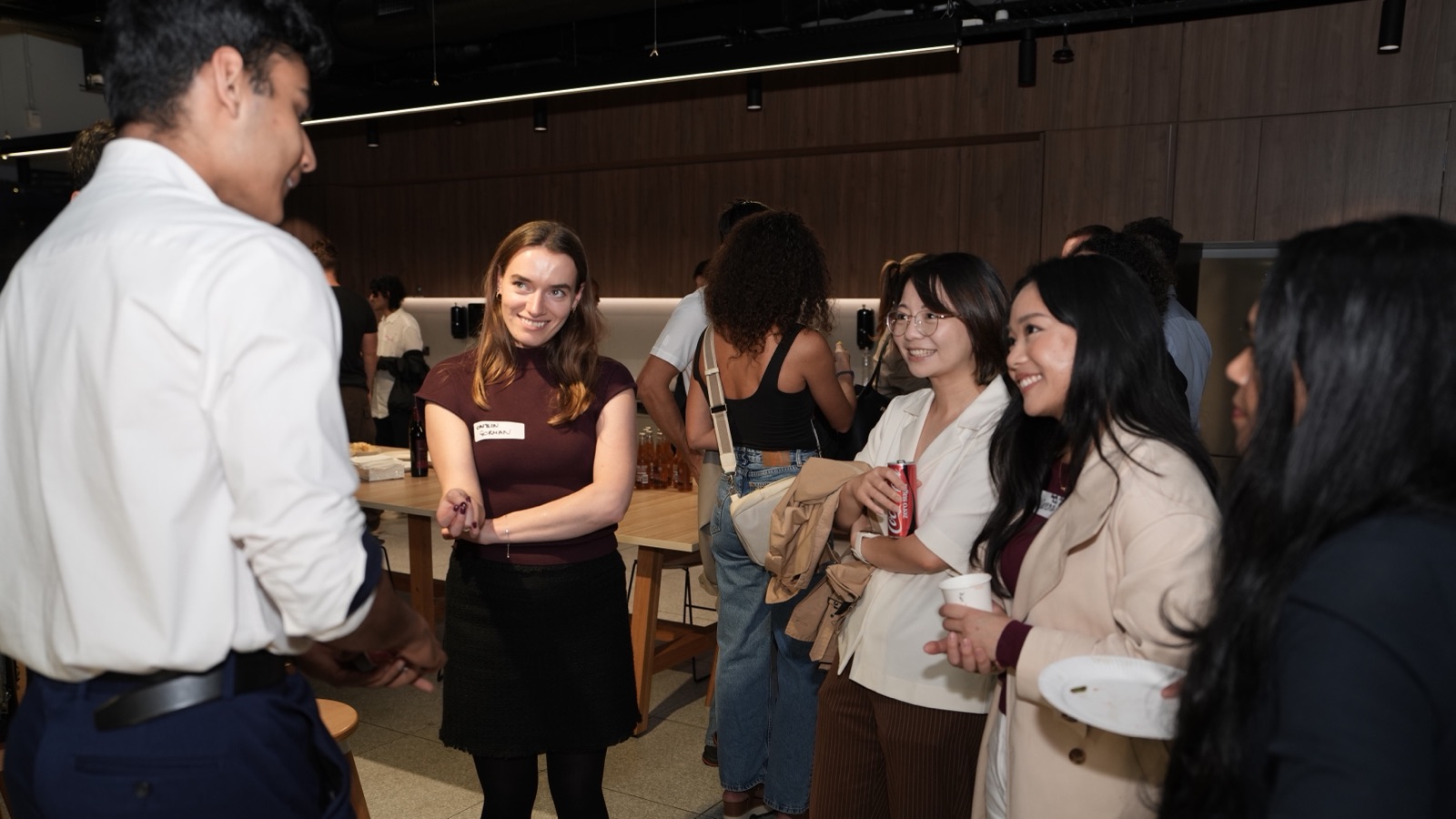 Mahir performing for a group of guests at a startup event
